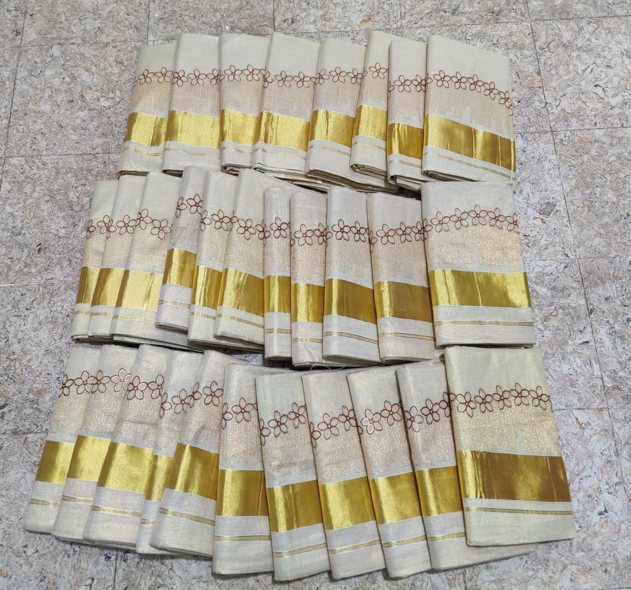 Flower shed golden tissue embroidered saree